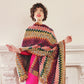 Knit Oversized Poncho in Rainbow Zigzag Pattern in Boho 70s Style